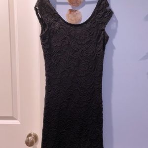 Tight black lace dress